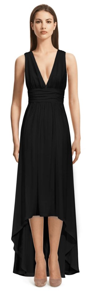 Black chiffon empire waist dress with flowing fabric, creating a soft and ethereal look for winter wedding celebrations.