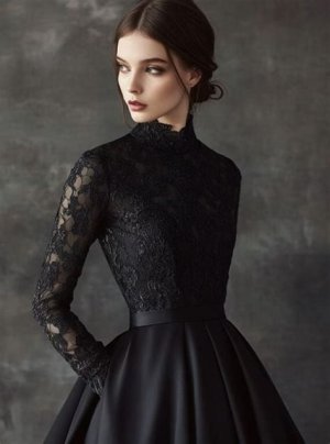 Black lace and satin A-line dress with intricate lace detailing and a flattering silhouette, perfect for winter wedding guests.