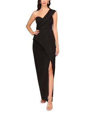 A bold black one-shoulder asymmetric gown with a high slit and flowing skirt, styled with metallic heels and a sleek clutch.